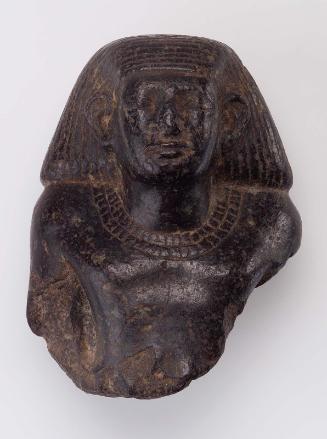 Fragment of a male statuette