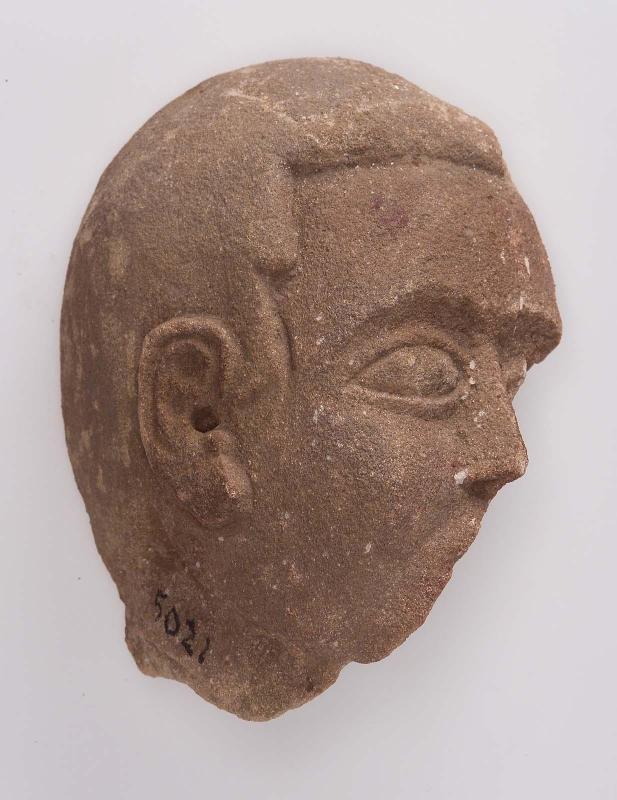 Fragmentary head of a ba statue