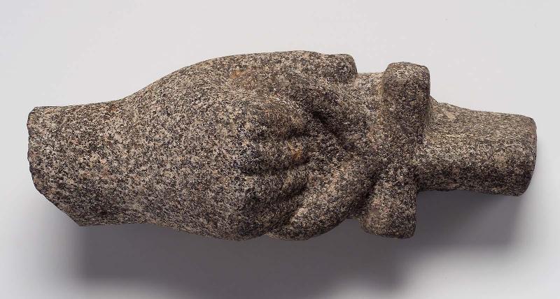 Hand holding an ankh