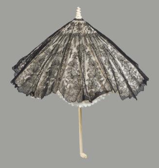 Small folding parasol of black bobbin lace