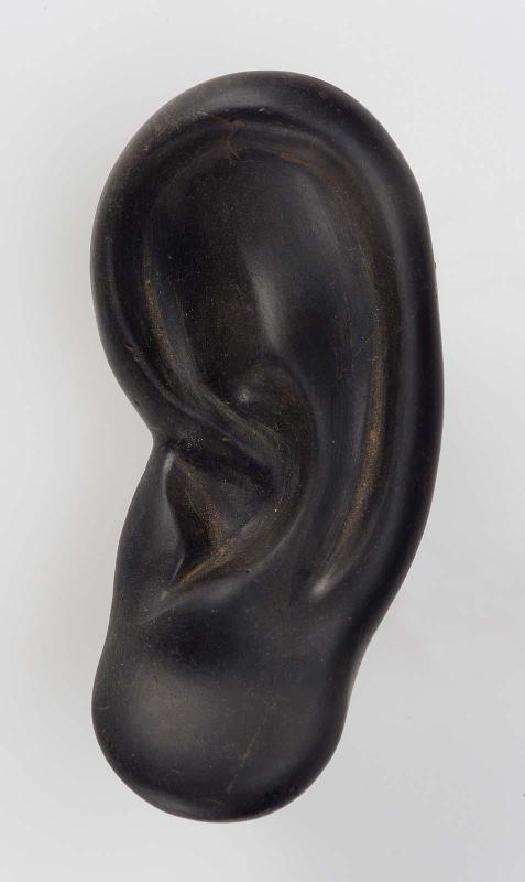 Left ear from a composite statue