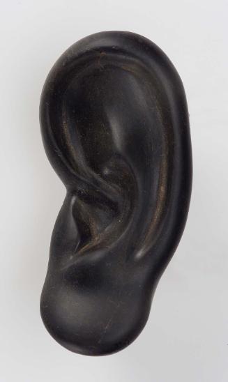 Left ear from a composite statue