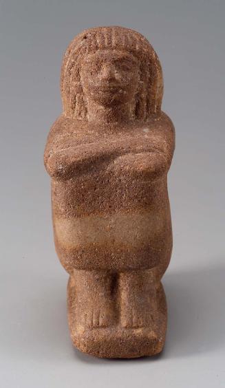 Statuette of a aquatting man