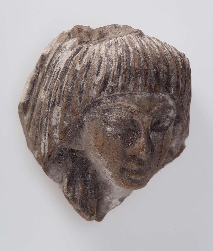 Part of a male head of statuette
