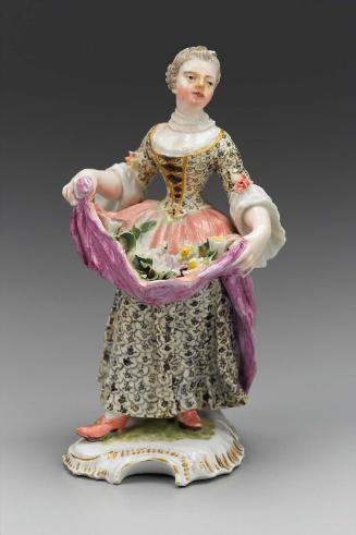 Figure of a lady holding flowers