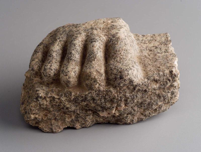 Sculpture fragment; toes and part of base