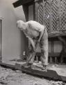 During Installation, man shoveling