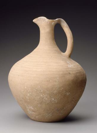 Imported long necked flask with pinched spout and handle