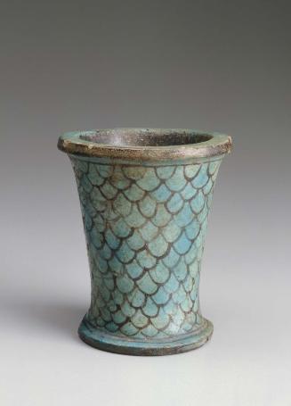 Vessel with a scale pattern