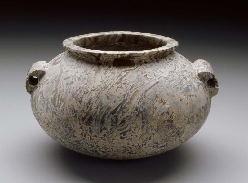 Squat vessel with pierced lug handles