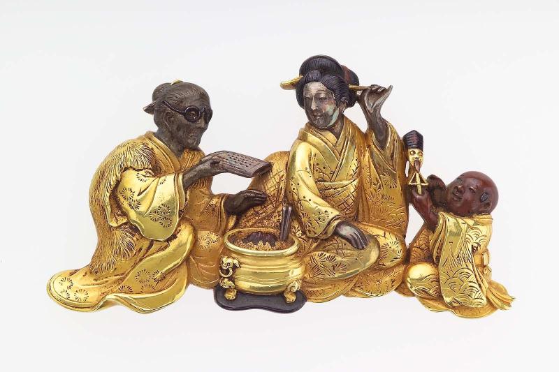 Kanamono in the form of a family group with a child, mother and grandmother