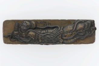 Kanamono in the form of a tennin holding a set of sho pipes