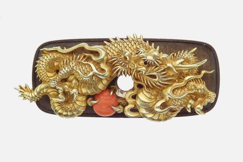 Kanamono in the form of a dragon and jewel, with backplate engraved with waves