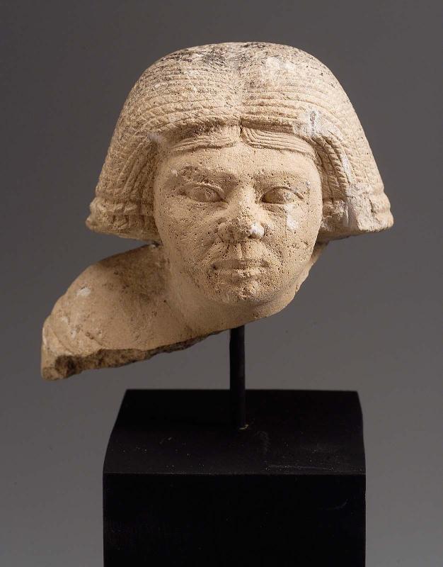 Female head of statuette