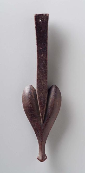 Peg, probably from musical instrument