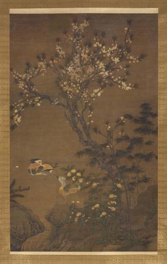 Mandarin ducks under peach blossoms