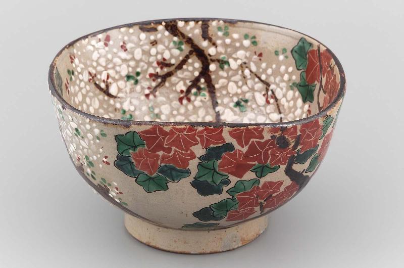 Bowl with a design of cherry and maple trees