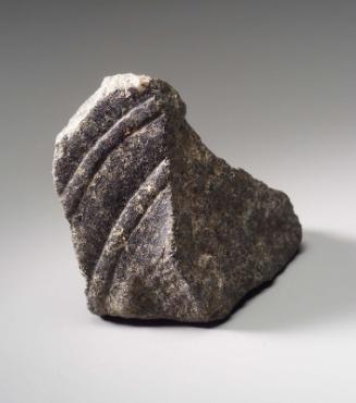 Sculpture fragment of nemes (?) of sphinx