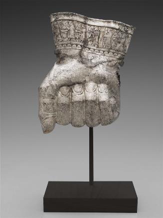 Drinking vessel in the shape of a fist