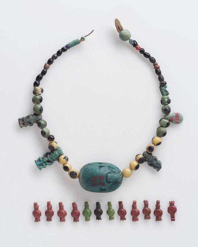 String of beads and amulets