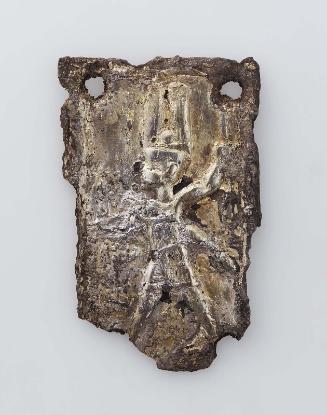 Plaque showing a smiting king