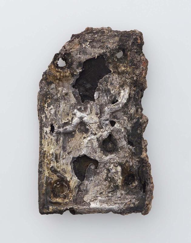 Plaque showing a smiting king