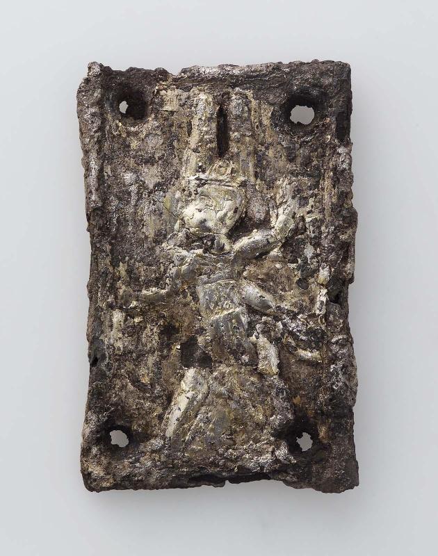 Plaque showing a smiting king