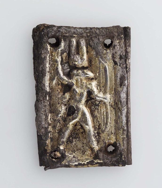 Plaque showing a smiting king