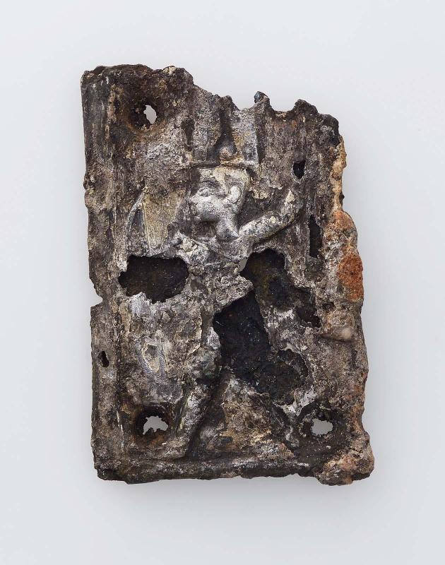 Plaque showing a smiting king