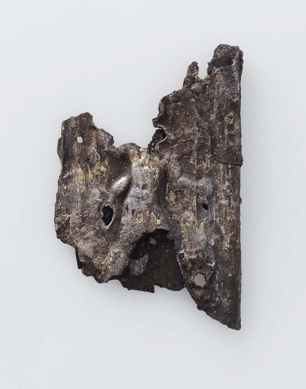 Plaque showing a smiting king