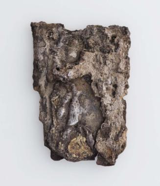 Plaque showing a smiting king