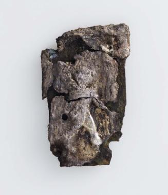 Plaque showing a smiting king