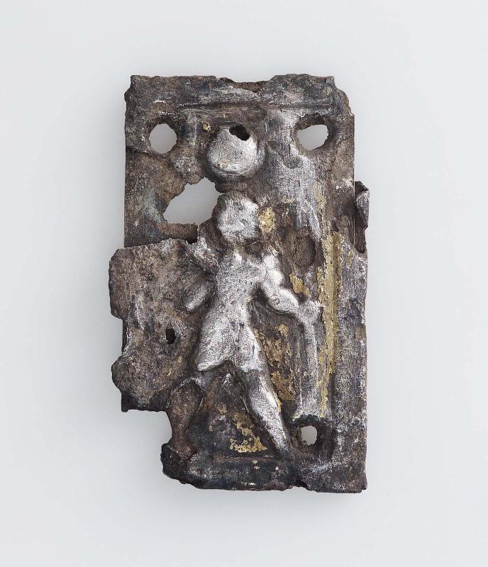 Plaque showing a smiting king