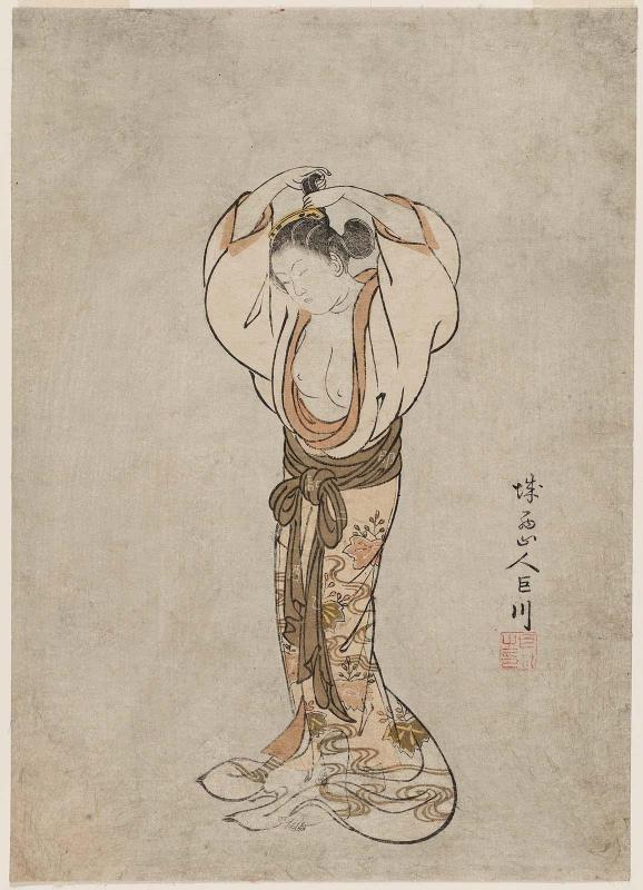 Woman Arranging Her Hair