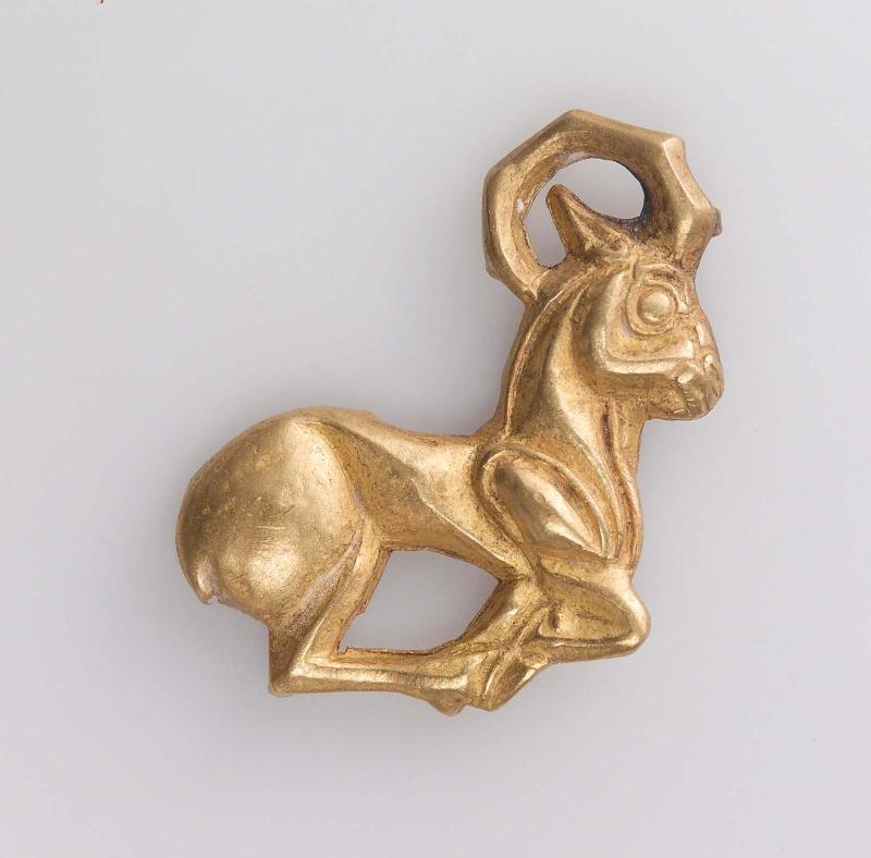 Appliqué in the form of a running quadruped