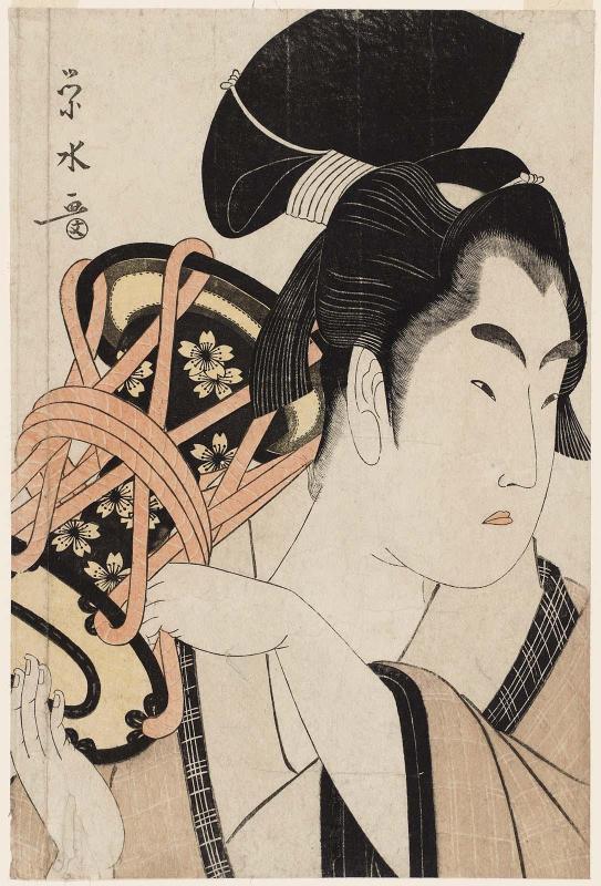 Young Man Playing a Hand Drum