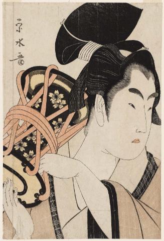 Young Man Playing a Hand Drum