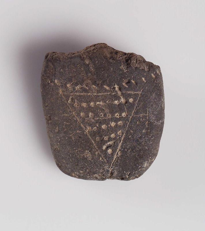 Fragment of a female figurine