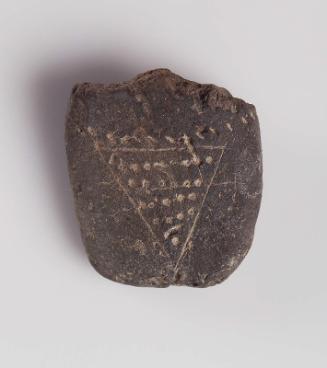 Fragment of a female figurine