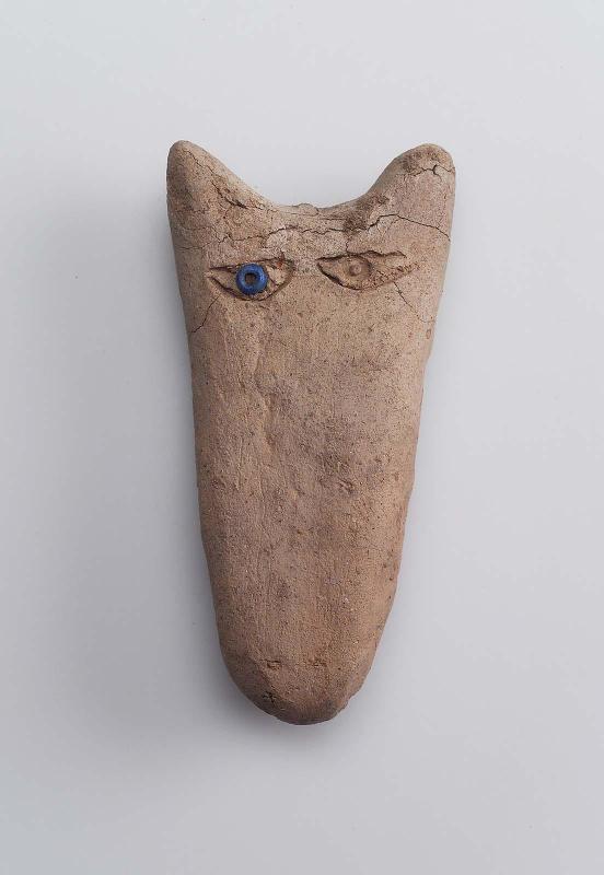 Mud figure with eyes