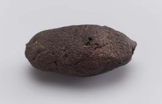 Pierced mud ball