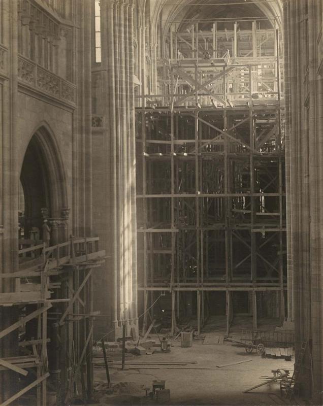 The Choir and Scaffolding Erected for the Triforium, Seen from the New Part of the Cathedral Saint Vitus from the portfolio Svàty Vit (Saint Vitus)