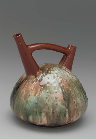 Double-spouted vessel