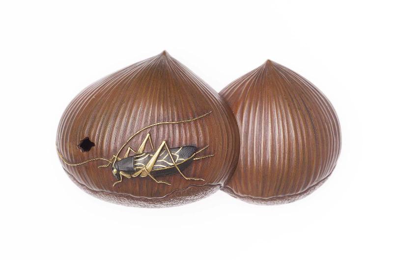 Kanamono in the form of a cricket on two chestnuts