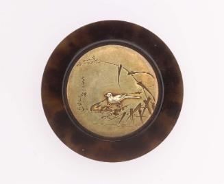 Kagami netsuke with design of long-tailed bird and grass