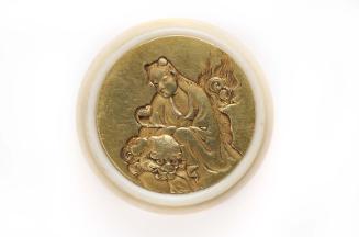 Kagami netsuke with design of Monju Bosatsu and lion
