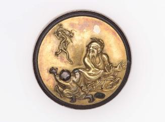 Kagami netsuke with design of Chinnan Sennin, dragon and boy attendant