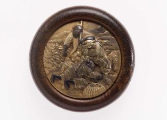 Kagami netsuke with design of the humiliation of Kanshin