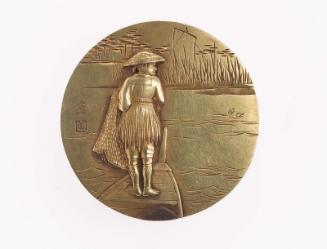 Kagami netsuke plate with design of a boatman