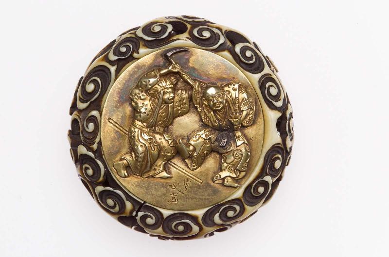 Kagami netsuke with design of two rustic dancers (?); bowl with stylized pines and balcony